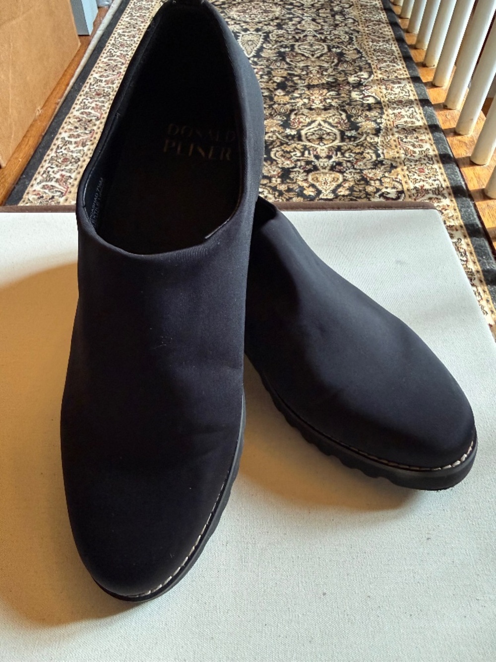 Donald Pliner black slip on loafers